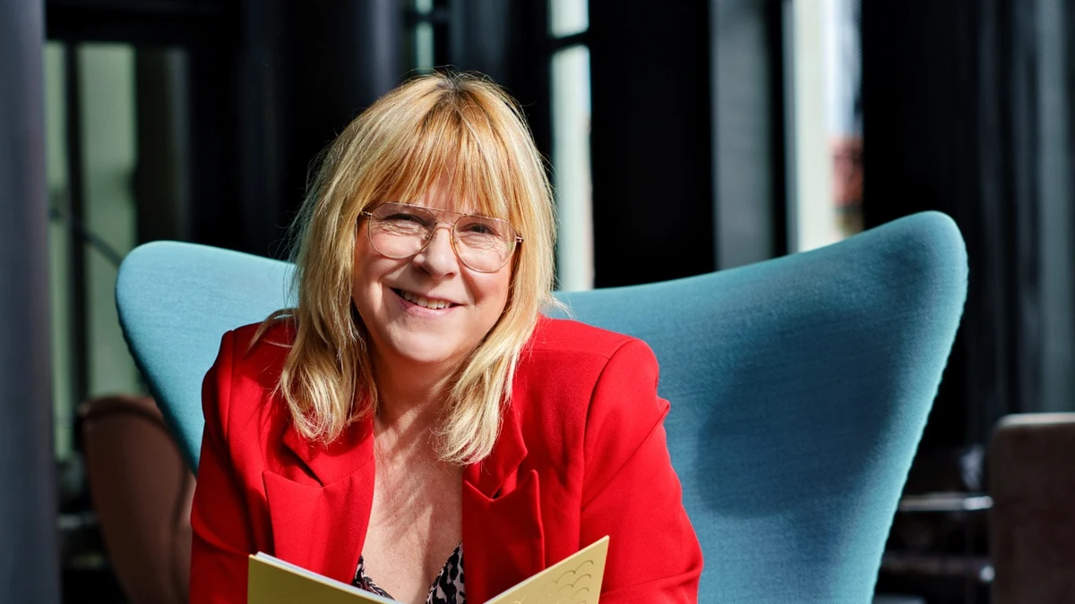 Sabine Blumhoff, Gründerin von Balance4Women, mit Notizbuch